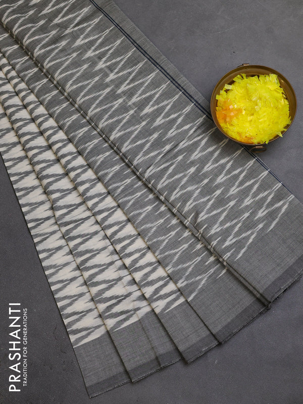 Ikat cotton saree cream and grey with allover ikat zig zag weaves and simple border