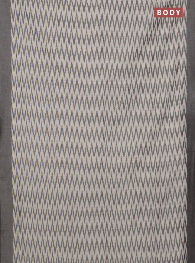 Ikat cotton saree cream and grey with allover ikat zig zag weaves and simple border