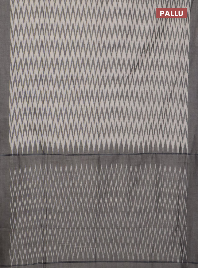 Ikat cotton saree cream and grey with allover ikat zig zag weaves and simple border