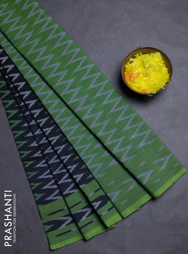 Ikat cotton saree navy blue and green with allover ikat zig zag weaves and rettapet ikat border