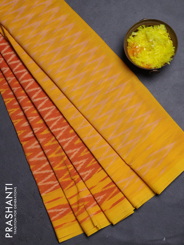 Ikat cotton saree dual shade of orange and yellow with allover ikat zig zag weaves and rettapet ikat border