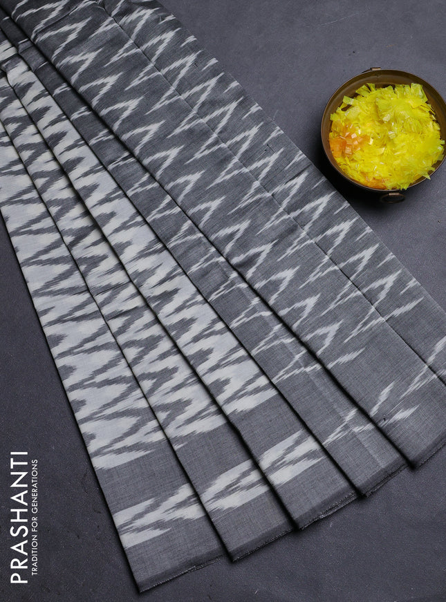 Ikat cotton saree cream and grey with allover ikat zig zag weaves and rettapet ikat border