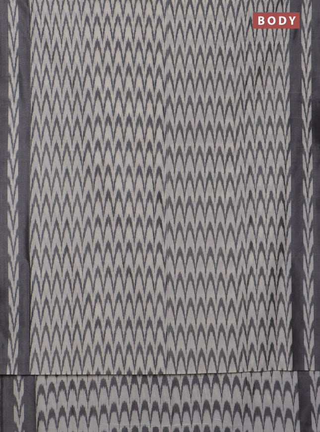 Ikat cotton saree cream and grey with allover ikat zig zag weaves and rettapet ikat border