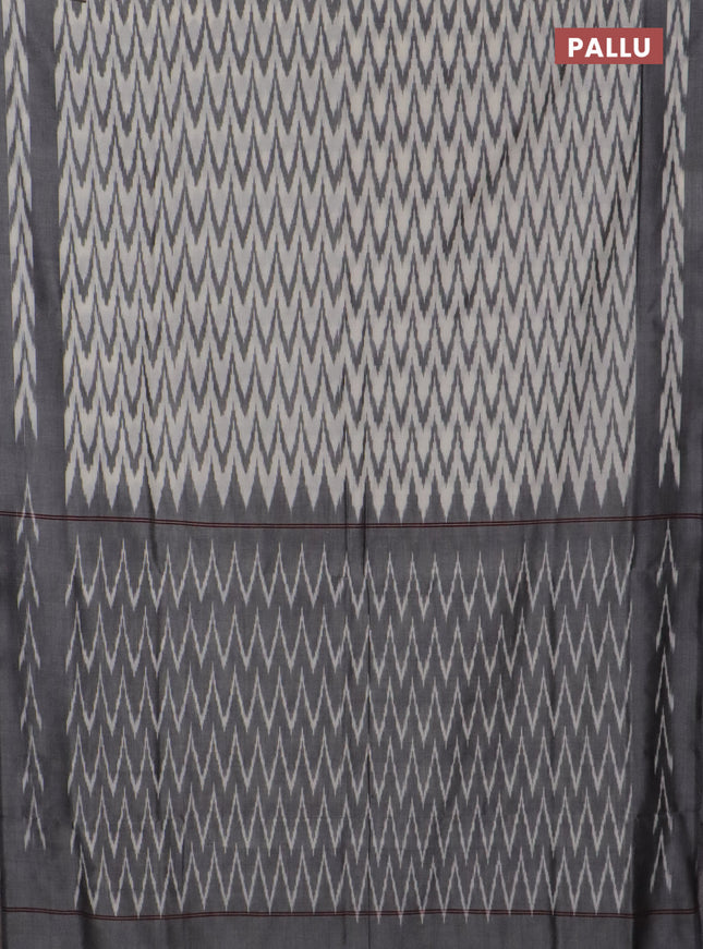 Ikat cotton saree cream and grey with allover ikat zig zag weaves and rettapet ikat border