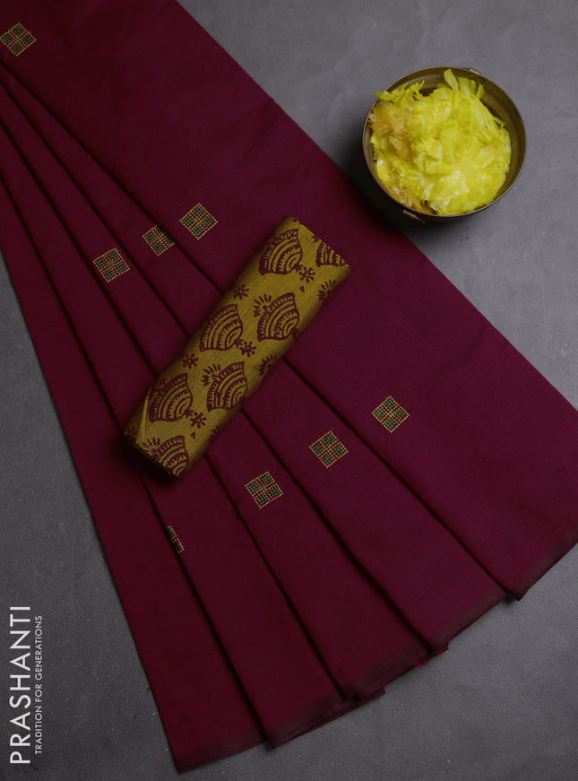 Semi silk cotton saree maroon and dark mustard with embroidery buttas in borderless style