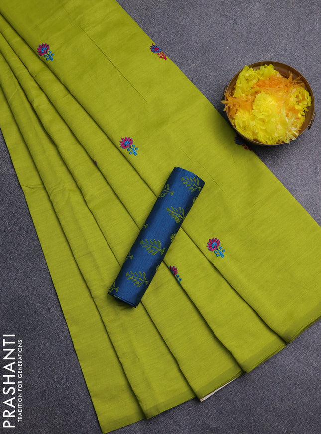 Semi silk cotton saree fluorescent green and cs blue with embroidery buttas in borderless style