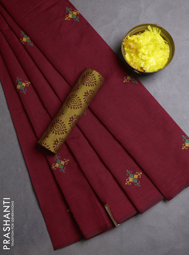 Semi silk cotton saree maroon and dark mustard with embroidery buttas in borderless style