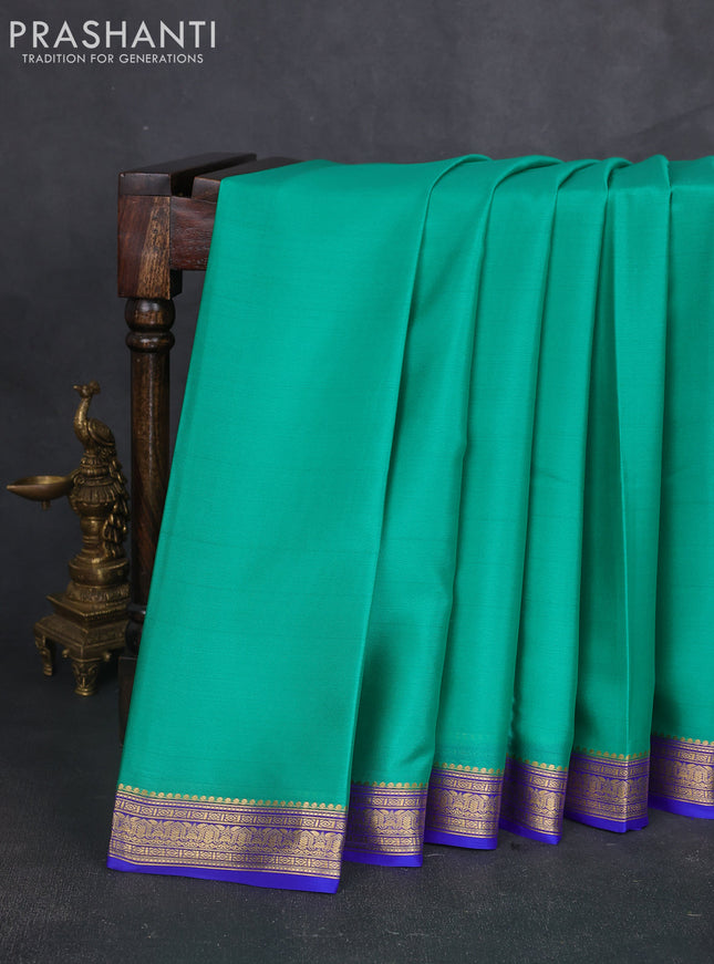 Pure mysore silk sareee teal green and royal blue with plain body and zari woven border