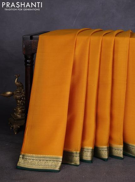 Pure mysore silk sareee mustard yellow and bottle green with plain body and zari woven border