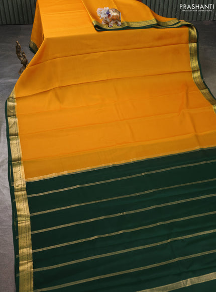 Pure mysore silk sareee mustard yellow and bottle green with plain body and zari woven border
