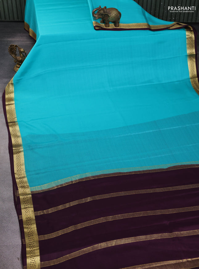 Pure mysore silk sareee teal blue and wine shade with plain body and zari woven border