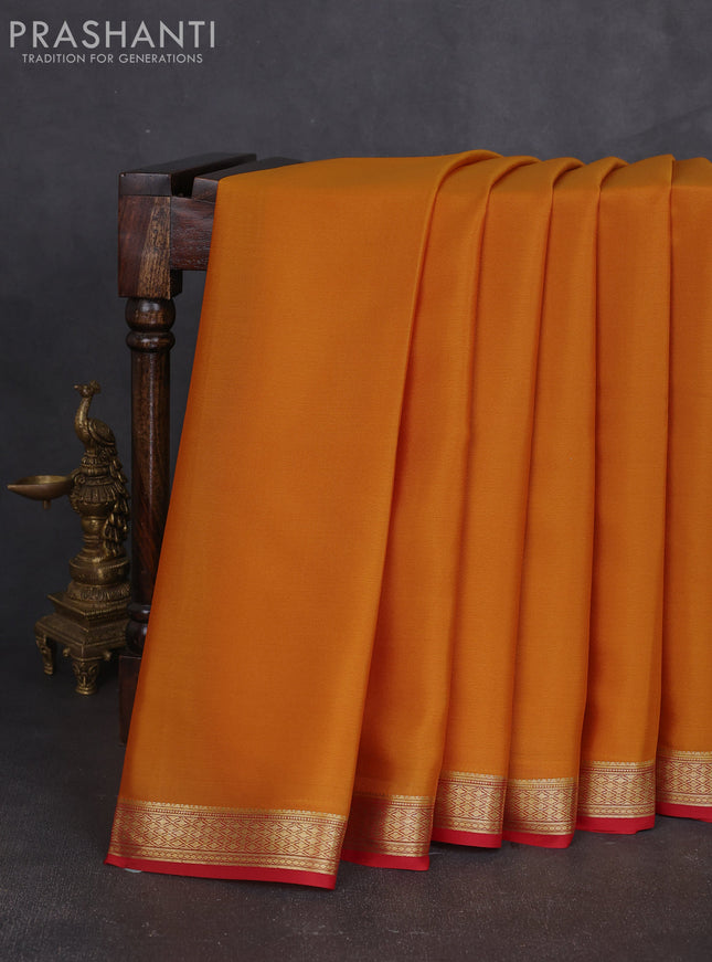Pure mysore silk sareee dark mustard and red with plain body and zari woven border