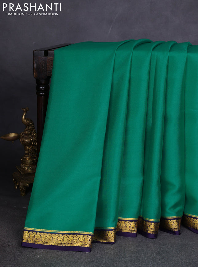Pure mysore silk sareee teal green and navy blue with plain body and zari woven border