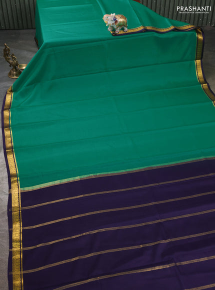 Pure mysore silk sareee teal green and navy blue with plain body and zari woven border