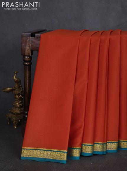 Pure mysore silk sareee rust shade and teal green with plain body and zari woven border