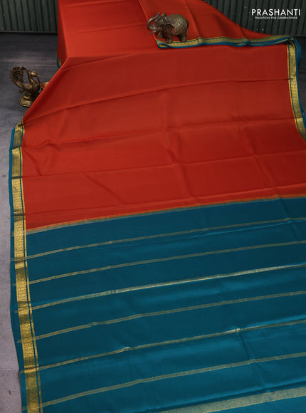 Pure mysore silk sareee rust shade and teal green with plain body and zari woven border