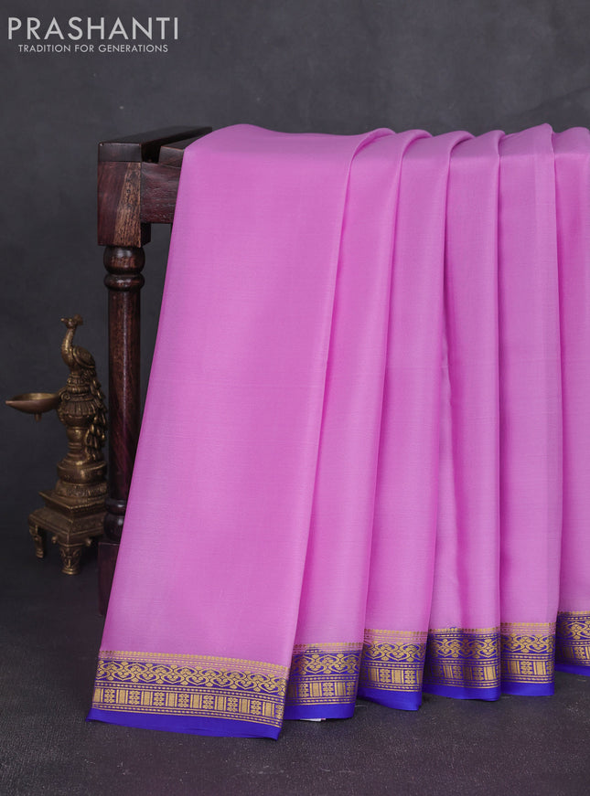 Pure mysore silk sareee lotus pink and royal blue with plain body and zari woven border