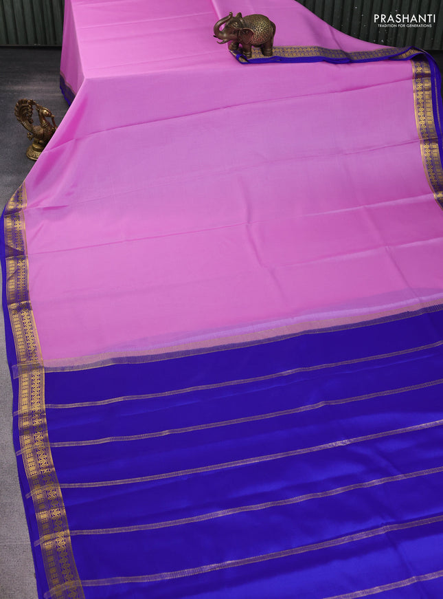 Pure mysore silk sareee lotus pink and royal blue with plain body and zari woven border
