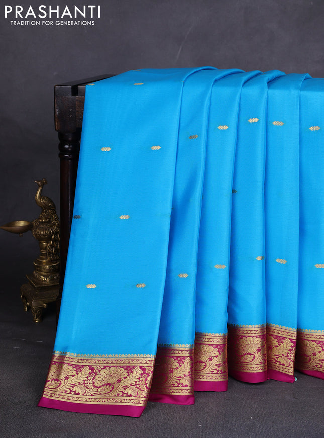 Pure mysore silk sareee light blue and magenta pink with zari woven buttas and zari woven border