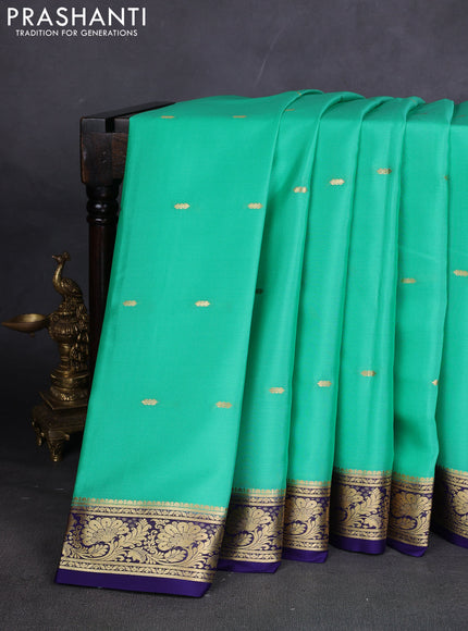 Pure mysore silk sareee teal green and navy blue with zari woven buttas and zari woven border