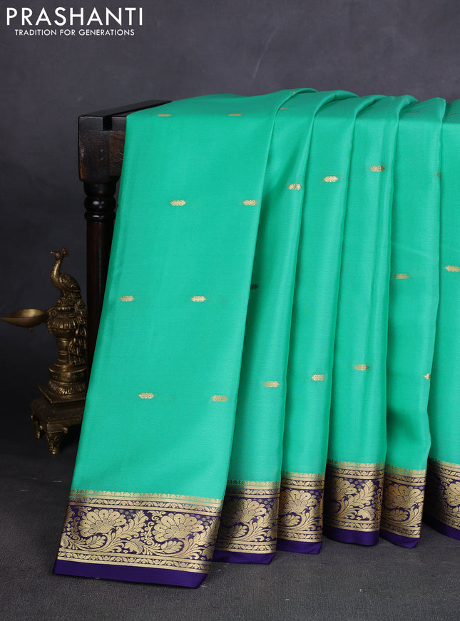 Pure mysore silk sareee teal green and navy blue with zari woven buttas and zari woven border