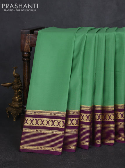 Pure mysore silk sareee pastel green and deep purple with plain body and zari woven border
