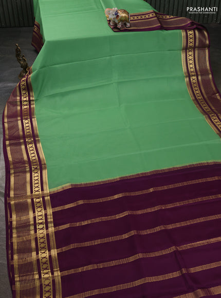 Pure mysore silk sareee pastel green and deep purple with plain body and zari woven border