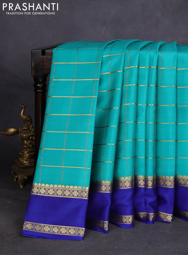 Pure mysore silk sareee teal shade and blue with allover zari woven checked pattern and rettapet zari woven border