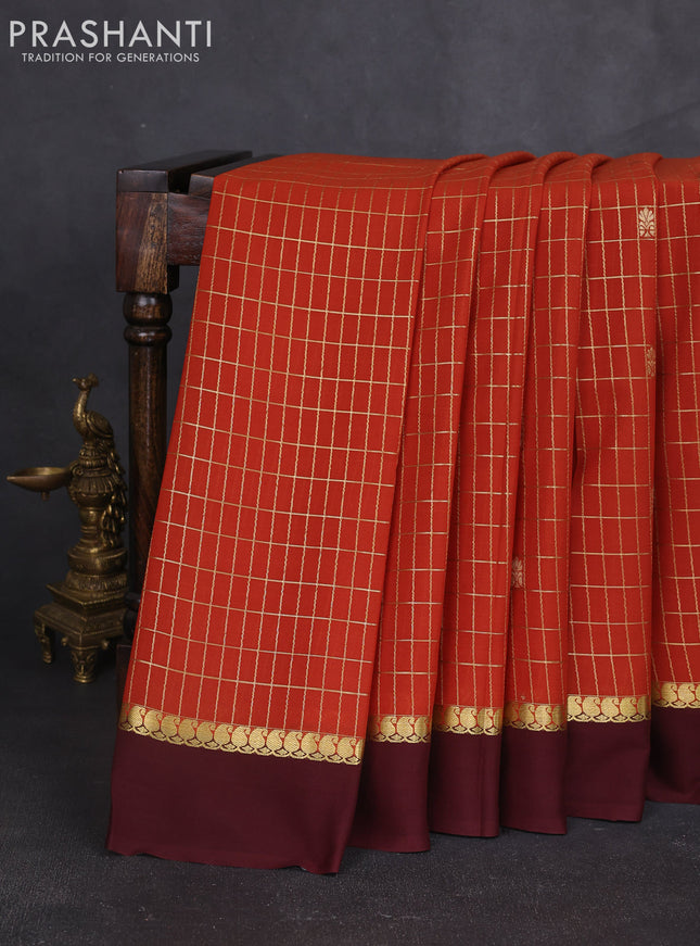 Pure mysore silk sareee rust shade and coffee brown with allover zari checks & buttas and zari woven simple border