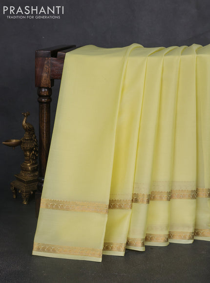 Pure mysore silk sareee pale yellow with plain body and rettapet zari woven border