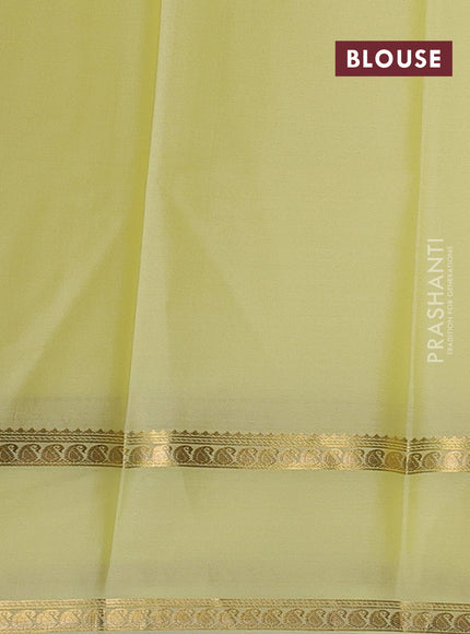 Pure mysore silk sareee pale yellow with plain body and rettapet zari woven border