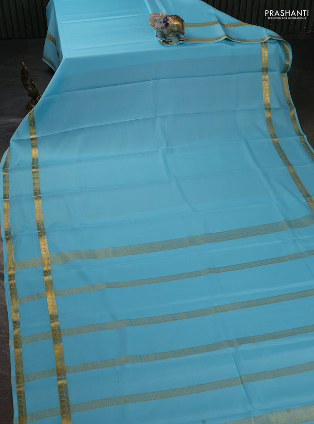 Pure mysore silk sareee light blue with plain body and rettapet zari woven border