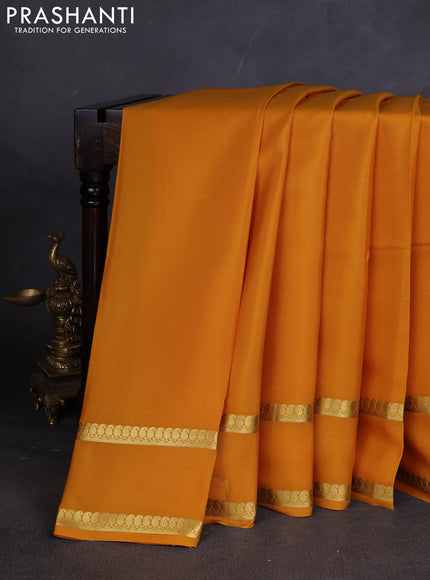 Pure mysore silk sareee mustard yellow with plain body and rettapet zari woven border