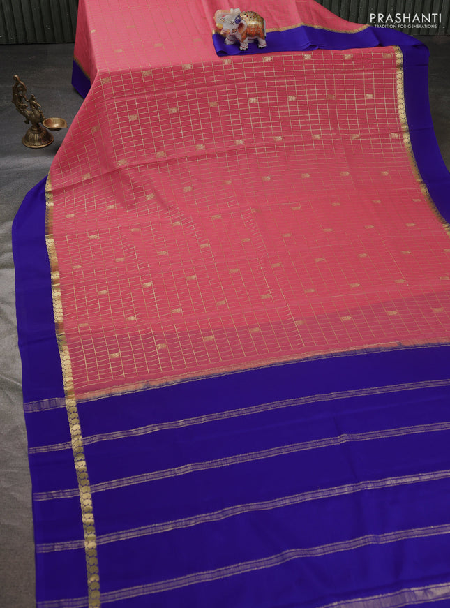 Pure mysore silk sareee peach pink shade and blue with allover zari woven checked pattern and zari woven simple border