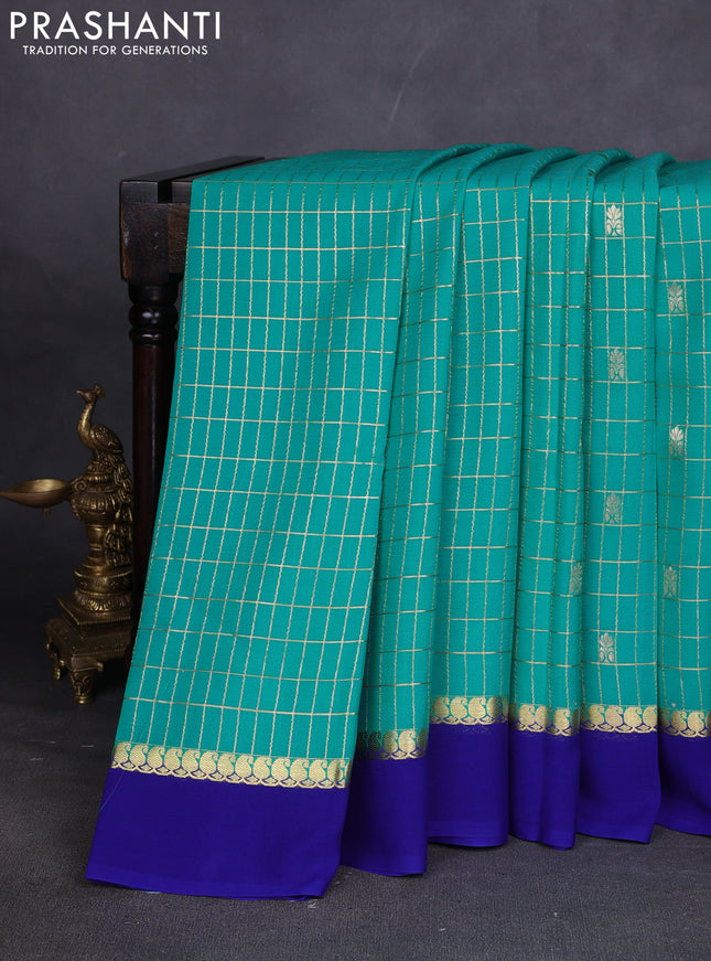 Pure mysore silk sareee teal shade and blue with allover zari woven checked pattern and zari woven simple border