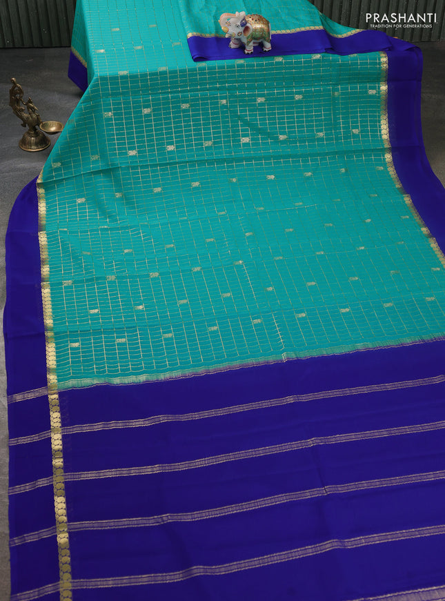 Pure mysore silk sareee teal shade and blue with allover zari woven checked pattern and zari woven simple border
