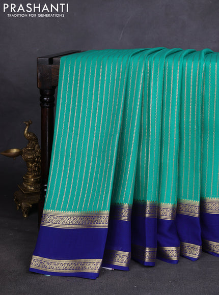 Pure mysore silk sareee teal green and blue with allover zari weaves and rettapet zari woven border