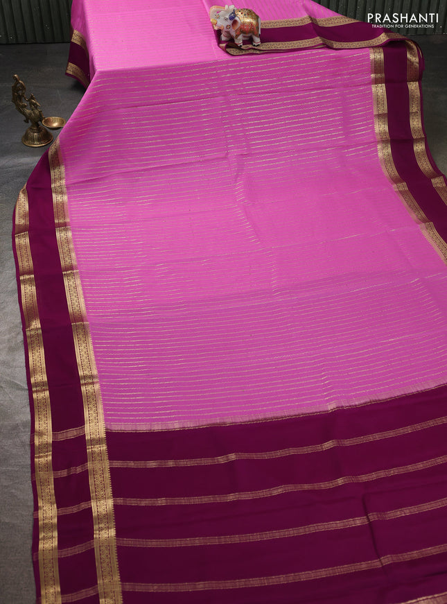 Pure mysore silk sareee light pink and purple with allover zari weaves and rettapet zari woven border