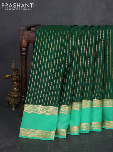 Pure mysore silk sareee bottle green and teal green with allover zari weaves and rettapet zari woven border