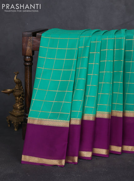 Pure mysore silk sareee teal green and purple with allover zari woven checked pattern and rettapet zari woven border
