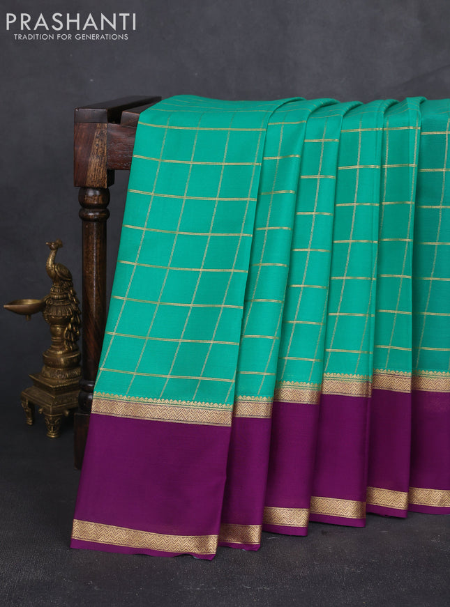 Pure mysore silk sareee teal green and purple with allover zari woven checked pattern and rettapet zari woven border