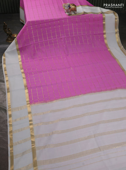 Pure mysore silk sareee lotus pink and off white with allover zari woven checked pattern and rettapet zari woven border