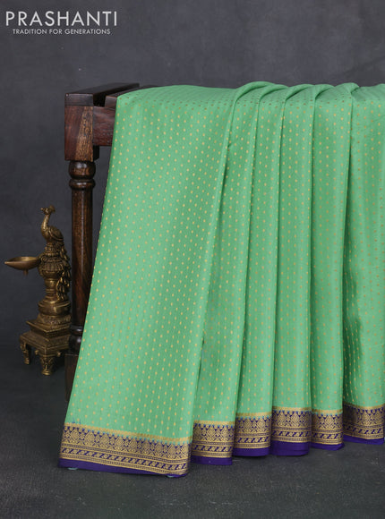 Pure mysore silk sareee pastel green and navy blue with allover zari woven buttas and zari woven border