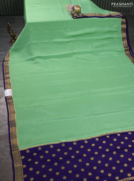 Pure mysore silk sareee pastel green and navy blue with allover zari woven buttas and zari woven border