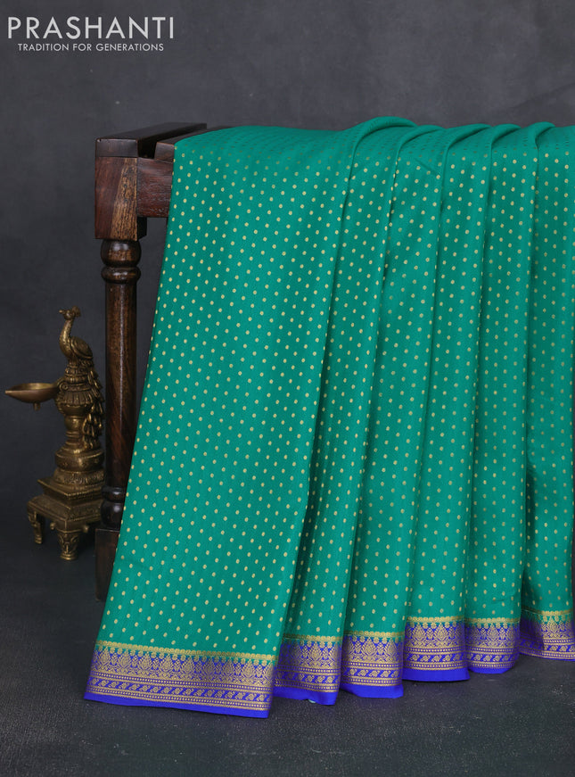 Pure mysore silk sareee teal green and royal blue with allover zari woven buttas and zari woven border