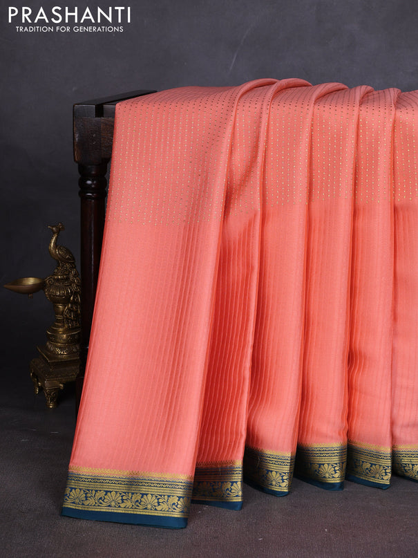 Pure mysore silk sareee peach shade and peacock green with allover zari woven buttas and zari woven border