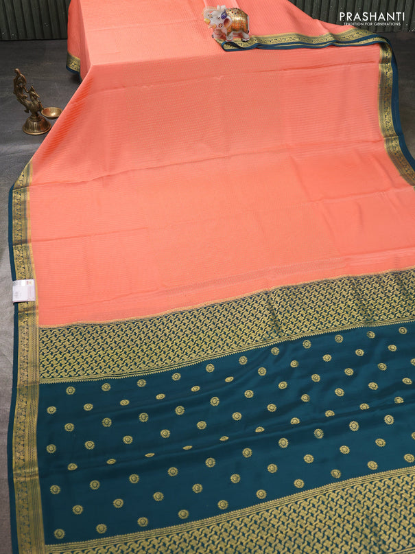 Pure mysore silk sareee peach shade and peacock green with allover zari woven buttas and zari woven border