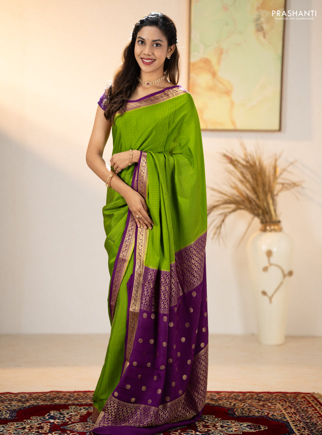 Pure mysore silk sareee mehendi green and purple with allover zari woven buttas and zari woven border