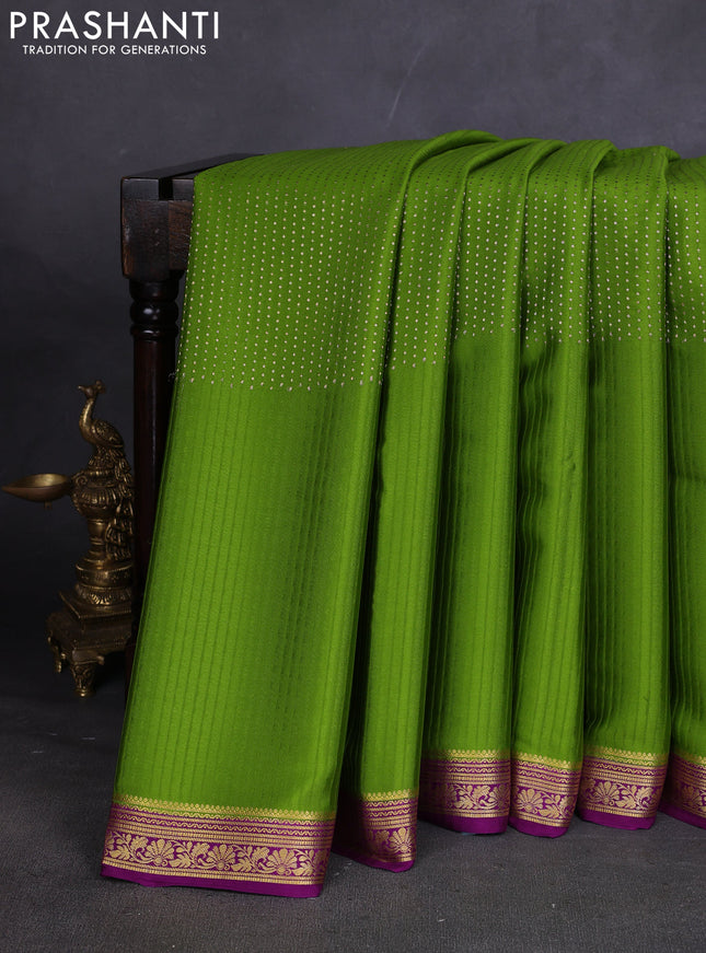 Pure mysore silk sareee mehendi green and purple with allover zari woven buttas and zari woven border