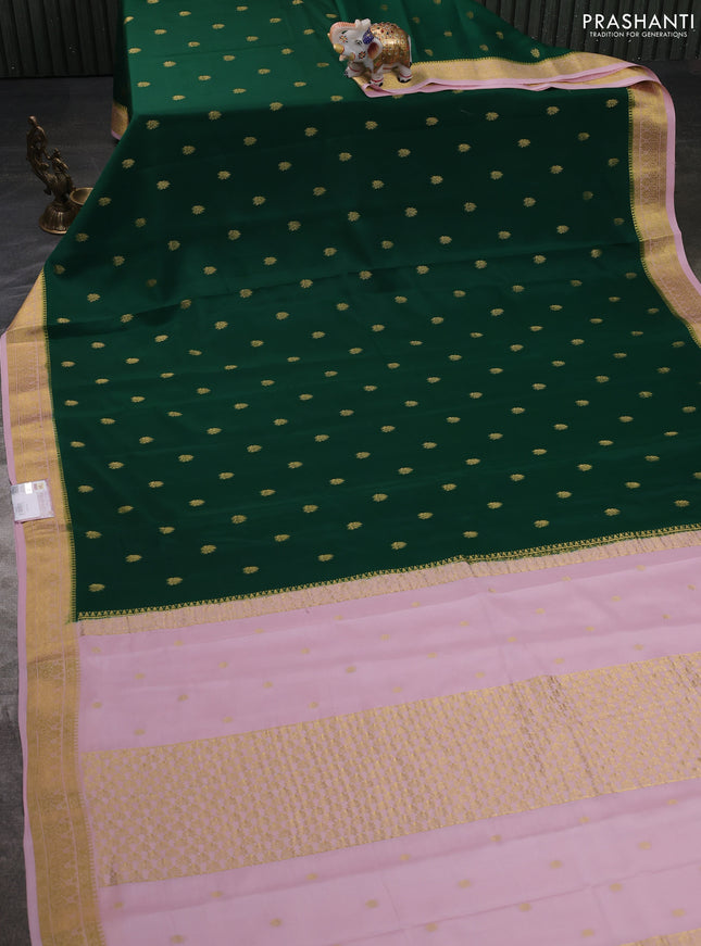 Pure mysore silk sareee dark green and mild peach pink with allover zari woven buttas and zari woven border